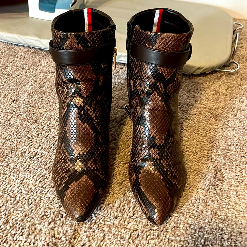 A pair of Tommy Hilfiger booties for women